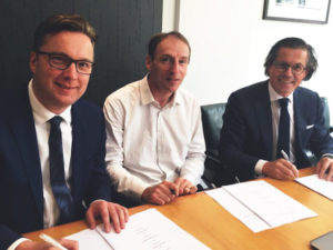 (L-R) EVBox CCO Peter van Praet, EVTronic founder and president Eric Stempin and EVBox CEO Kristof Vereenooghe  